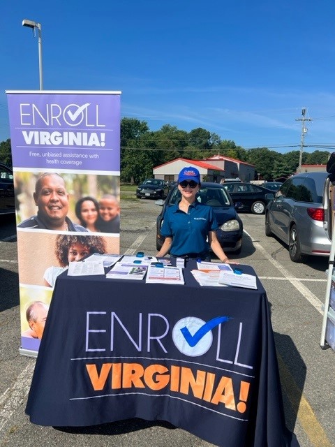 Navigator at an outreach event in a parking lot